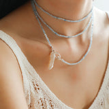 Collana con ciondolo con chiusura OT in perle barocche e pietre preziose e stuzzicadenti