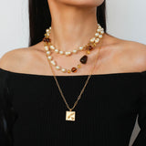 Byzantine Elegance Gourd Pearl Necklace Classic Light Luxury Sweater Chain