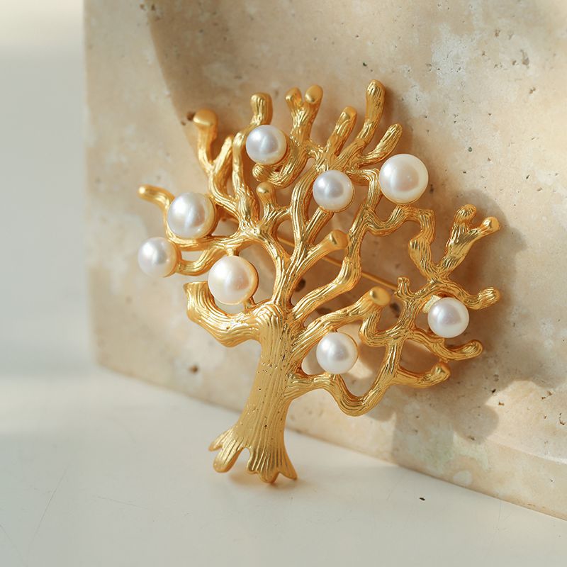 Broche antique de perle d’arbre d’argent