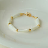 Bracelet artisanal en perles de nacre blanche