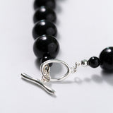 Collana con perline di onice nero da 14 mm con fibbia OT