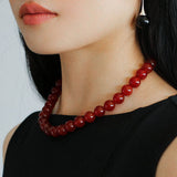 Collana vintage con perline rotonde da 12 mm in onice rosso