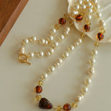 Byzantine Elegance Gourd Pearl Necklace Classic Light Luxury Sweater Chain