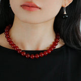 Collana vintage con perline rotonde da 12 mm in onice rosso