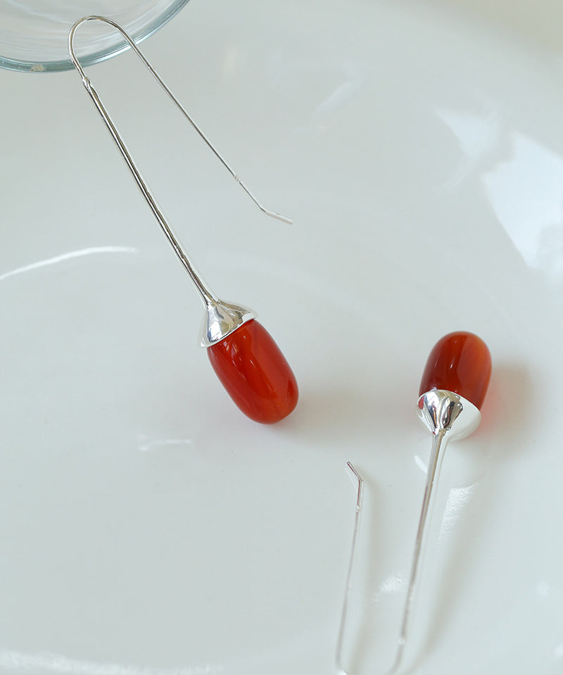 Orecchini pendenti con ganci per l'orecchio in argento sterling con onice rosso