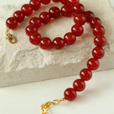 Collana vintage con perline rotonde da 12 mm in onice rosso