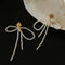 Bow Dance Metal Lava Petite Bow Long Pearl Earrings - floysun