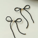 Elegant Woven Pearl Bow Long Earrings - floysun