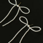 Elegant Woven Pearl Bow Long Earrings - floysun