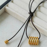 Long Black Leather Necklace with Striped Geometric Pendant - floysun