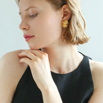 Metallic Striped Texture Twisted Earrings - floysun