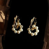 Pendientes de aro colgantes con flores y perlas