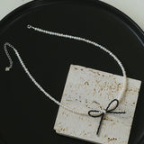 Rice Pearl Clavicle Chain Black Spinel Bow Necklace - floysun