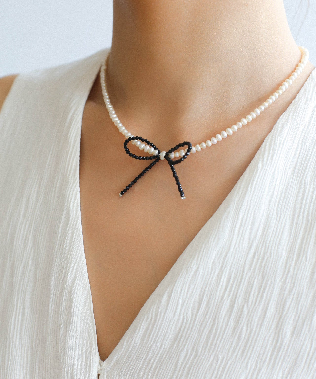 Rice Pearl Clavicle Chain Black Spinel Bow Necklace - floysun