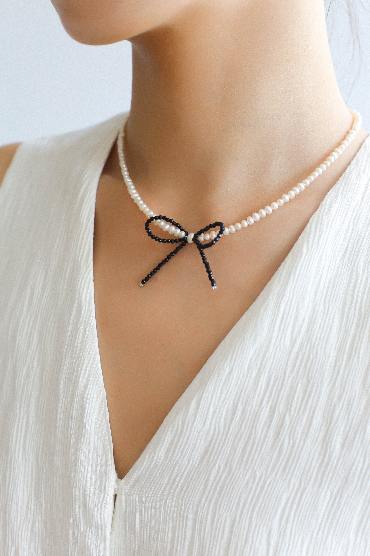 Rice Pearl Clavicle Chain Black Spinel Bow Necklace - floysun