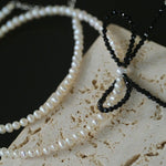 Rice Pearl Clavicle Chain Black Spinel Bow Necklace - floysun