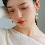 Water Droplet Paneled Ball Earrings - floysun