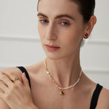 Perlenverzierte Halskette mit Onyx-Tigerauge-Anhänger